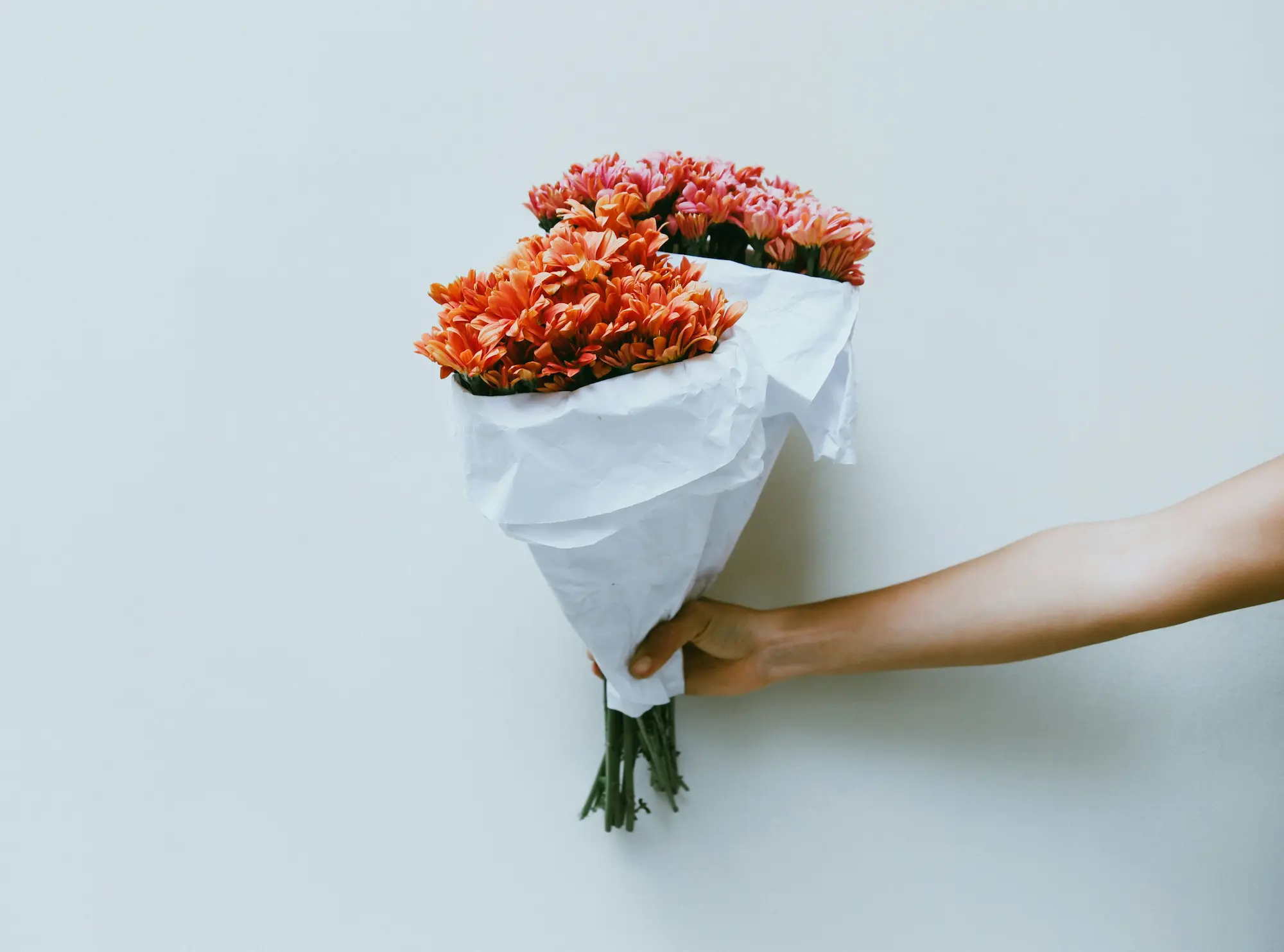 Bouquet de fleurs rouges-oranges